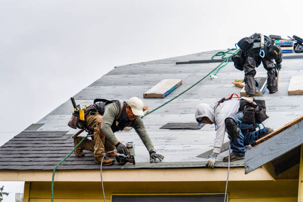 Professional Storm Damage Roof Repair technician working in Smithtown, NY